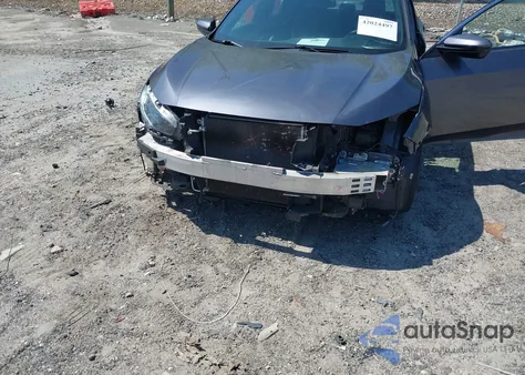 2019 Honda Civic Sport z USA, uszkodzony, nr VIN 2HGFC2F85KH576547